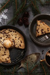 Homemade Skillet Chocolate chip cookie with a Dollop of ice cream ,top view