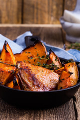 Roast chicken thighs with butternut squash and thyme herb