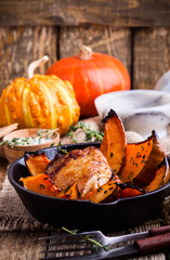 Roast chicken thighs with butternut squash and thyme herb