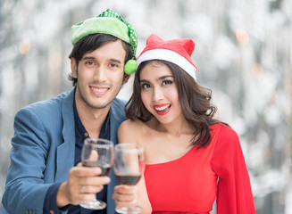 Red wine Christmas party concept. Happy new year coming soon.People celebrating happy drinks with friends