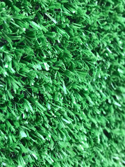 Side view of artificial green turf background
