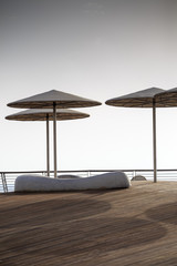 Umbrellas from the sun on the embankment of Tel Aviv. Israel.