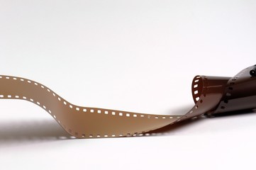 Twisted film strip on white background.