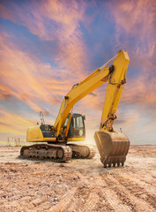 Heavy earth mover with blue sky in the background © xiaoliangge