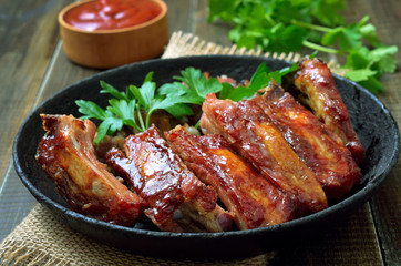 Appetizer roast sliced pork ribs