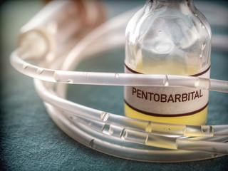 Vial with pentobarbital used for euthanasia and lethal inyecion in a hospital, conceptual image