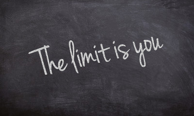 Fototapeta premium the limit is you chalk written text on a black board