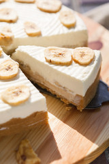 Delicious banana cake on table