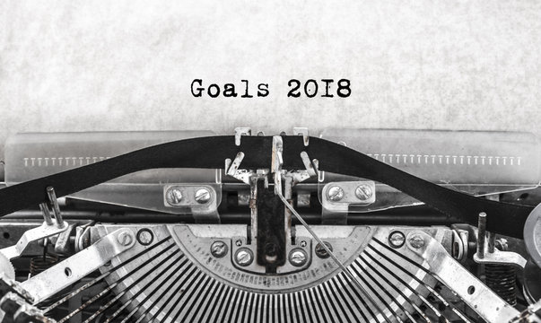 old vintage typewriter happy new year written goals 2018