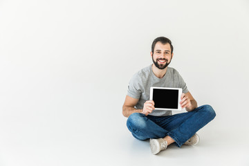 man using digital tablet