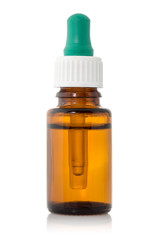 Fototapeta premium Brown medicine glass bottle with dropper
