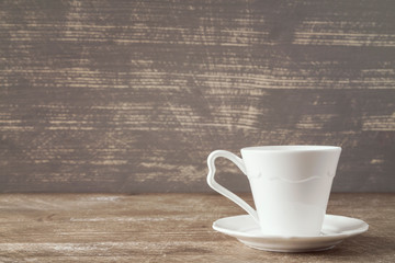 White espresso cup with a saucer