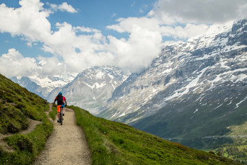 Fototapeta na wymiar Biking through the Swiss Alps