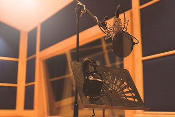Condenser microphone in professional recording studio