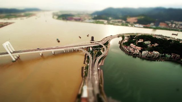 Minature Highway Stack Interchange (tilt-shift) Exrtreme wide shot of Avenida Panoramica do Lago Sai Van