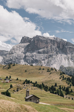 Rural view of houses in mountain valley (Val Gardena) in Dolomites, Italy