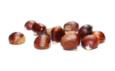 Pile edible chestnut isolated on white background