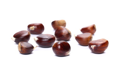 Pile edible chestnut isolated on white background