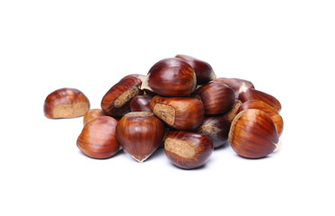 Pile edible chestnut isolated on white background