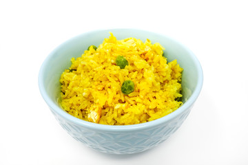 Homemade Chinese fried rice with vegetables and fried eggs
