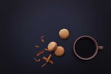 cinnamon macaroons with cup of coffee