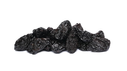 Dry prunes pile isolated on white background