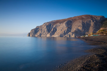 Fototapeta premium Sea cliff and calm sea
