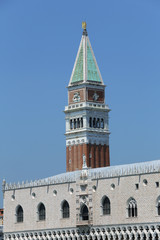 Fototapeta na wymiar Venice Italy The high Bell Tower of Saint Mark and ancient palac