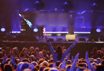 young woman at live concert