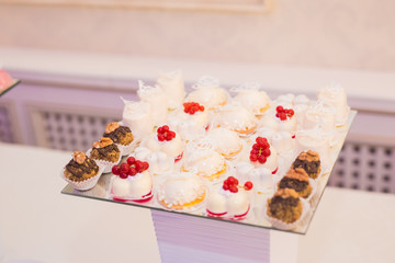 Naklejka na ściany i meble Delicious wedding reception candy bar dessert table