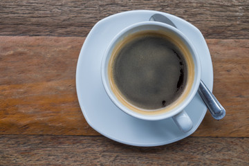 Black coffee on the wood table.