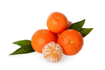 Orange Mandarines, Clementines, Tangerines or small oranges with one peeled with leaves isolated on white background, cut out or cutout