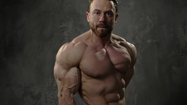 Man showing his muscular body