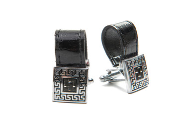 black cufflinks isolated