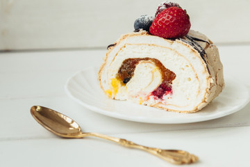 beautiful cake with cream and fruits