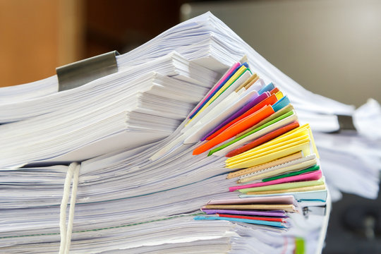 Close up of business documents stack on desk , report papers stack