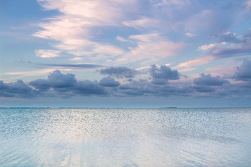 Empty sea landscape with dramatic sunset cloudy sky