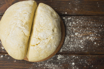 dough with close-up. man is preparing bread dough