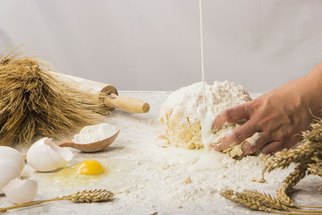 dough with close-up. man is preparing bread dough