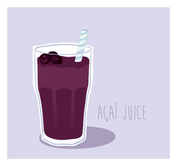 Energy drink - Acai fruit juice in a glass with a straw