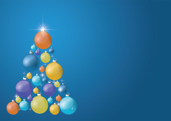 Beautiful modern Christmas tree with colorful balls on a blue background. copy-space for text .