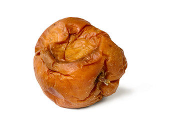 Old rotten apple on white isolated background