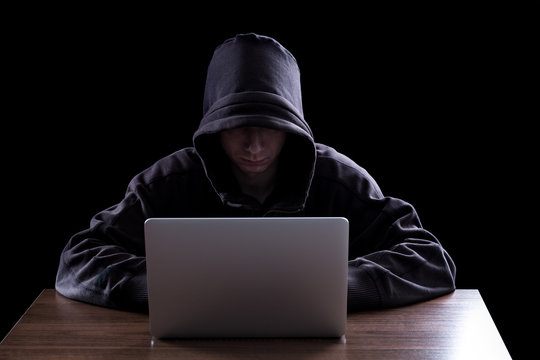 Anonymous hacker in the dark