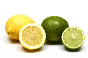 Studio shot image of fresh organic juicy lemons and limes isolated on a white background  