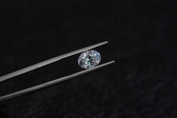 Diamond oval cut in tweezers