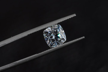 Diamond in tweezers
