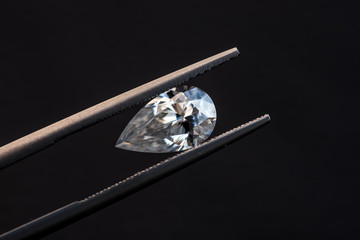 Diamond pear cut in tweezers