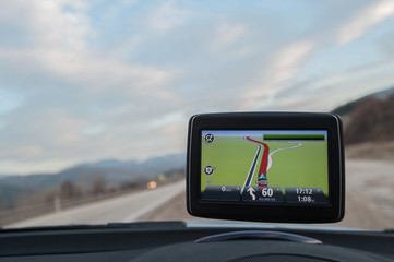 Display of a car navigation system while on the road