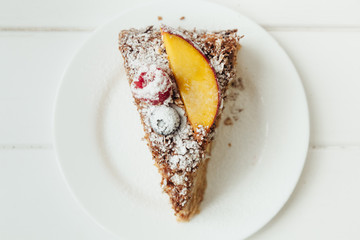 beautiful cake with cream and fruits