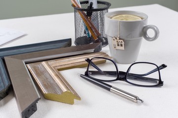 Home renovation. Workplace of the architect, designer with drawings, samples of decorative materials